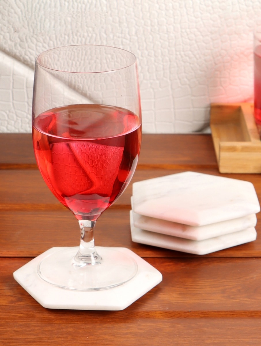 White Marble Hexagonal Coasters – Set of Four