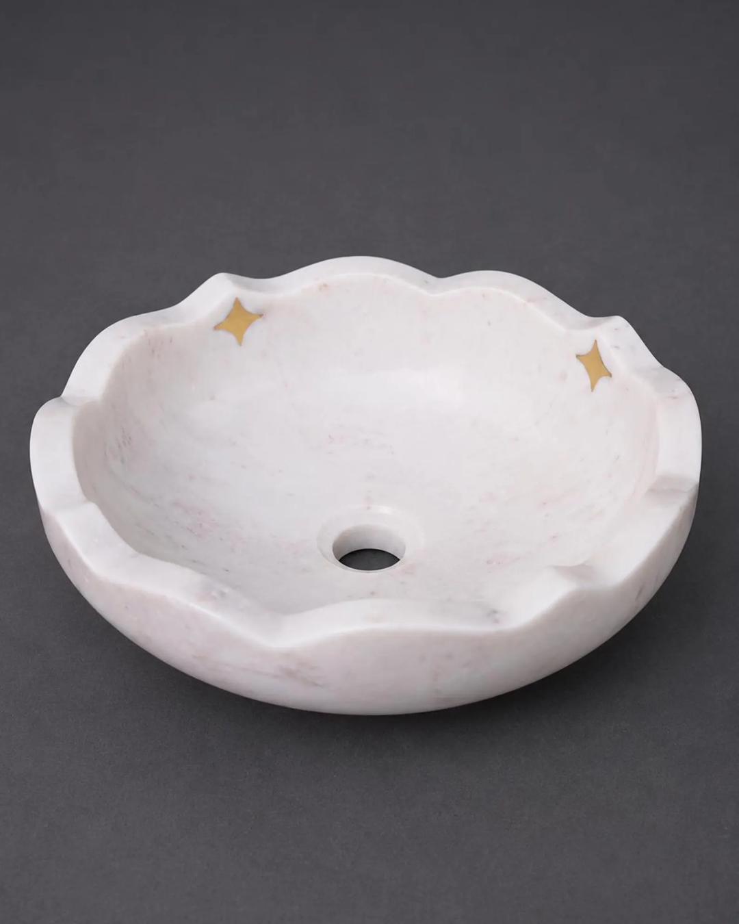 White Marble Scalloped Vessel Sink with Metal Stars