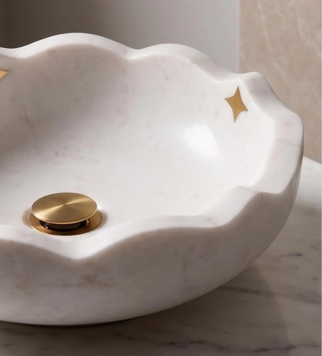 White Marble Scalloped Vessel Sink with Metal Stars