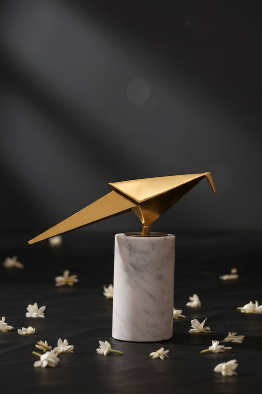 Metal Bird Sculpture on White Marble Base