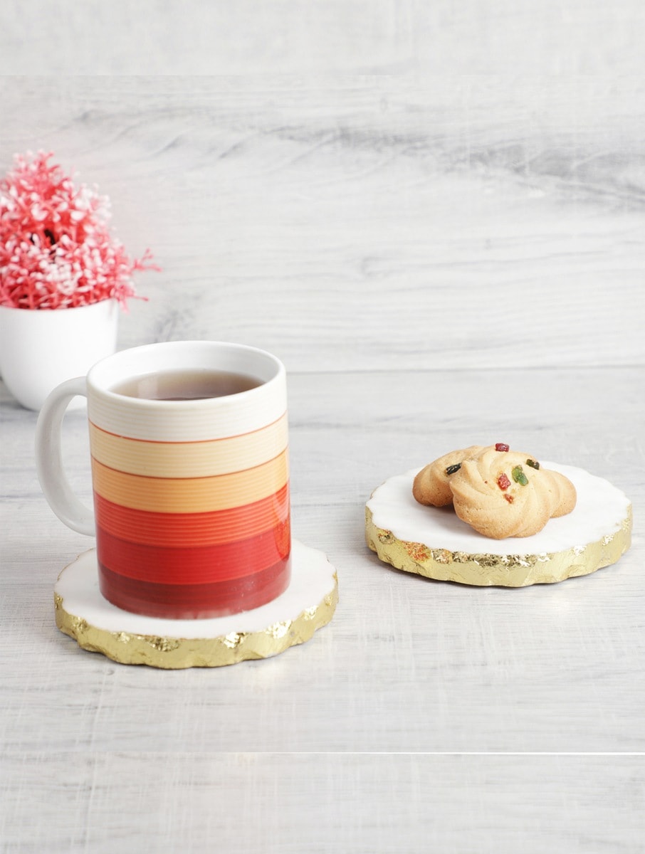 White Marble Round Coasters with Metal Edge – Set of Two
