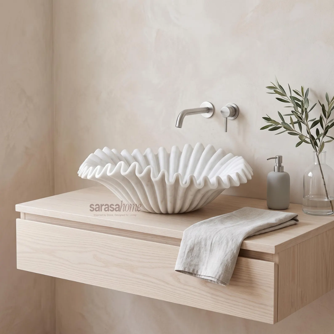 White marble ruffle vessel sink with fluted exterior